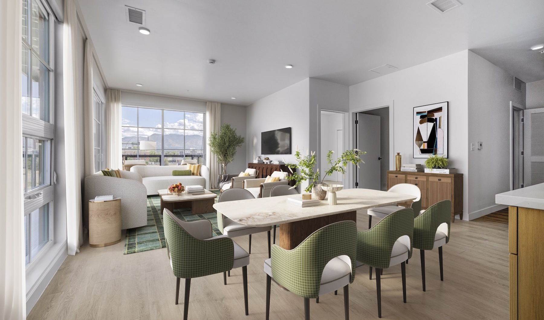 Wide open living areas perfect for entertaining a living room with a table, chairs and a couch