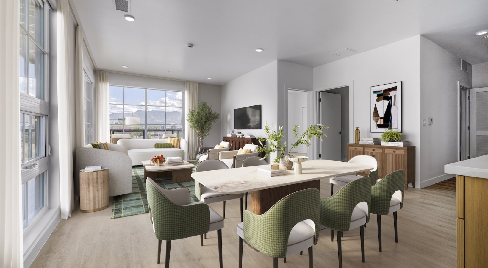 Wide open living areas perfect for entertaining a living room with a table, chairs and a couch