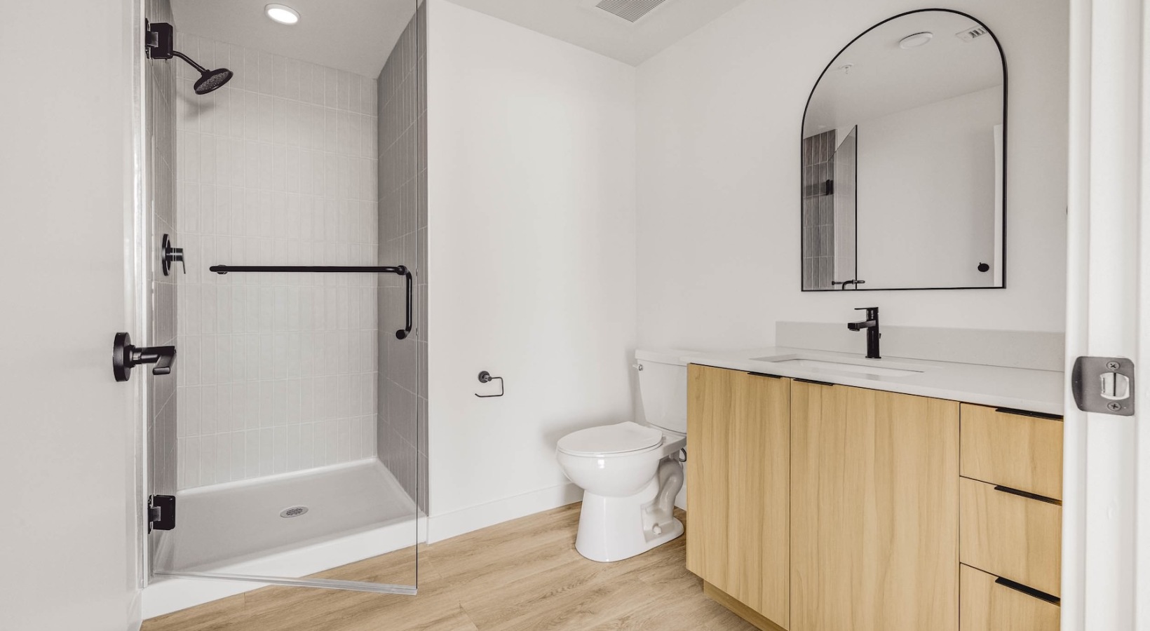 Spacious bathrooms with everything you need a bathroom with a tub, sink and toilet